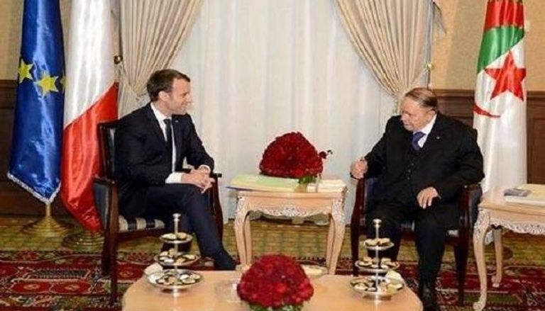 الرئيس الجزائري ونظيره الفرنسي في لقاء سابق - أرشيفية