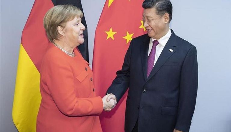  لقاء سابق بين الرئيس الصيني وميركل على هامش قمة العشرين