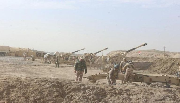 قوات الجيش العراقي خلال عمليات القصف - صورة في وسائل الإعلام 