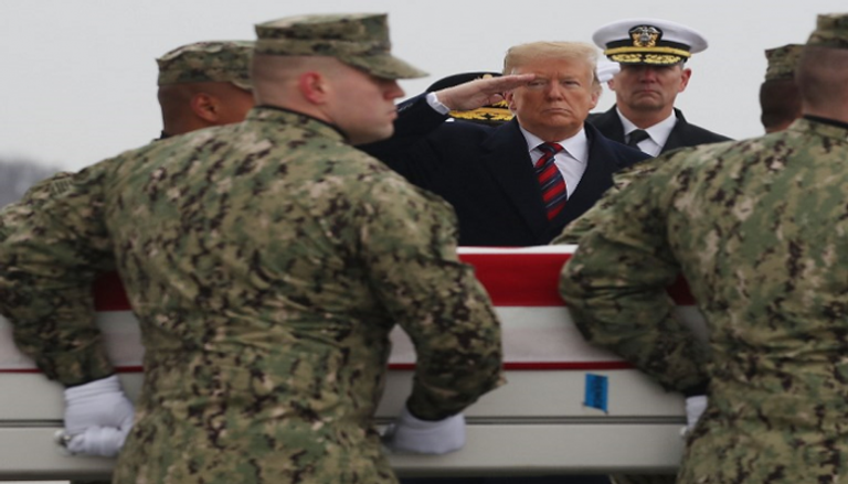 ترامب خلال استقباله جثامين ضحايا هجوم منبج بقاعدة دوفر 