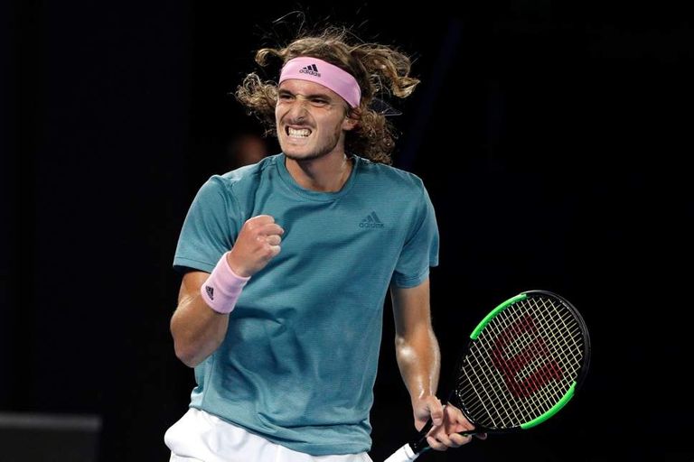 ستيفانوس تيتيباس لاعب التنس روجيه فيدرر