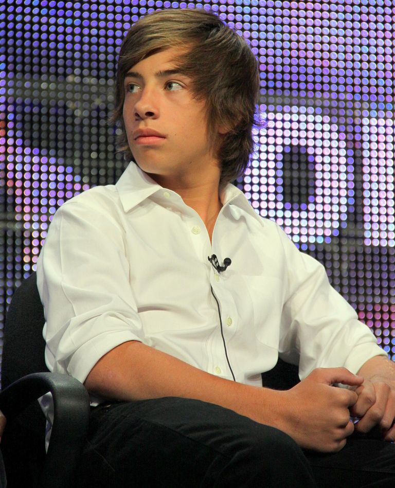 أزيا أرجنتو (يسار) مع المغنية والممثلة الأمريكية روز ماكجوان