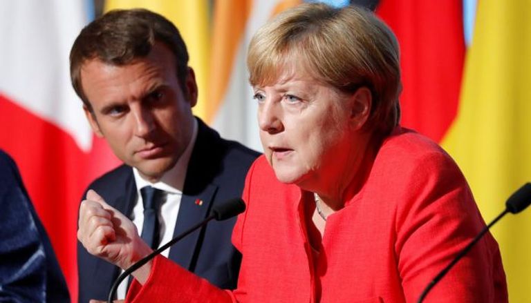 ميركل وماكرون 