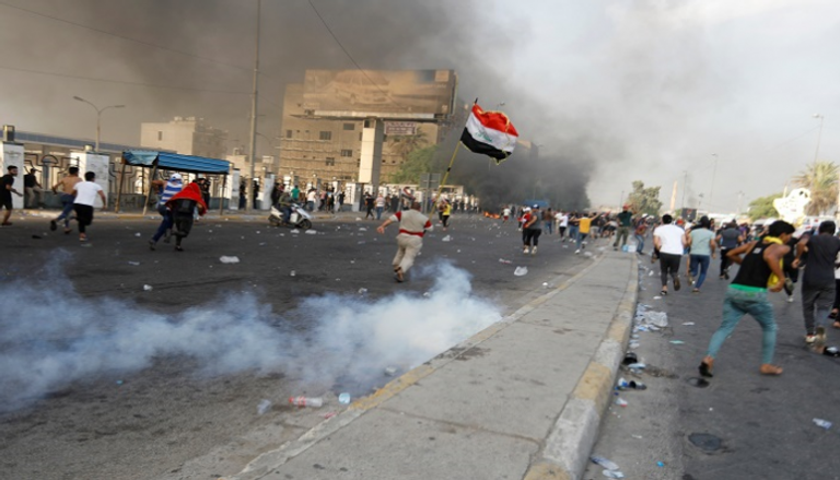 قوات الأمن العراقية تفرق محتجين -  رويترز