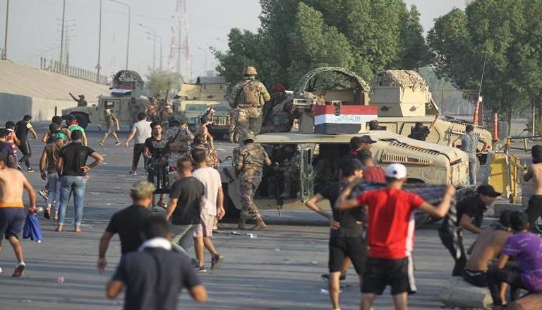 اشتباكات بين المتظاهرين وقوات الأمن العراقية