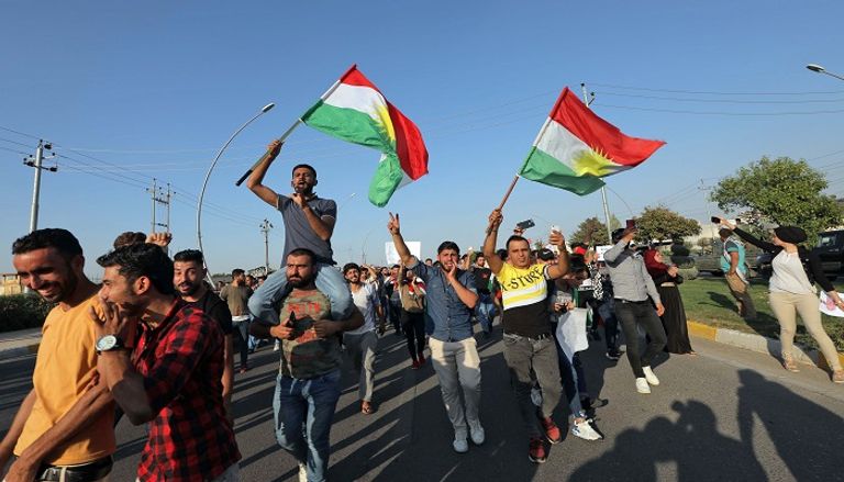 مظاهرة لأكراد العراق ضد العدوان التركي على سوريا - الفرنسية