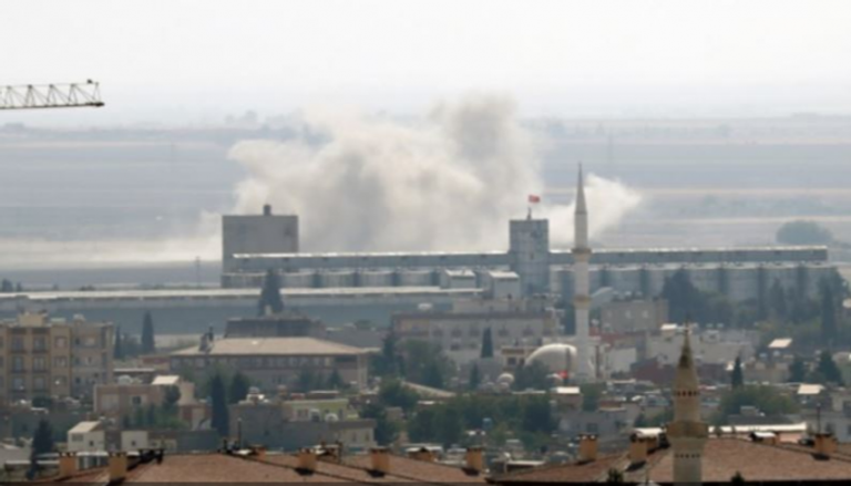 تصاعد الدخان بعد القصف التركي على بلدة رأس العين - رويترز