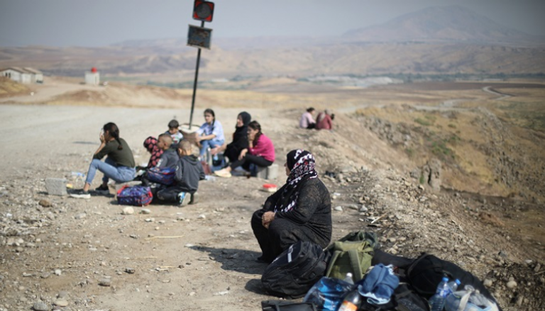 عائلات كردية نازحة من ضحايا العدوان التركي