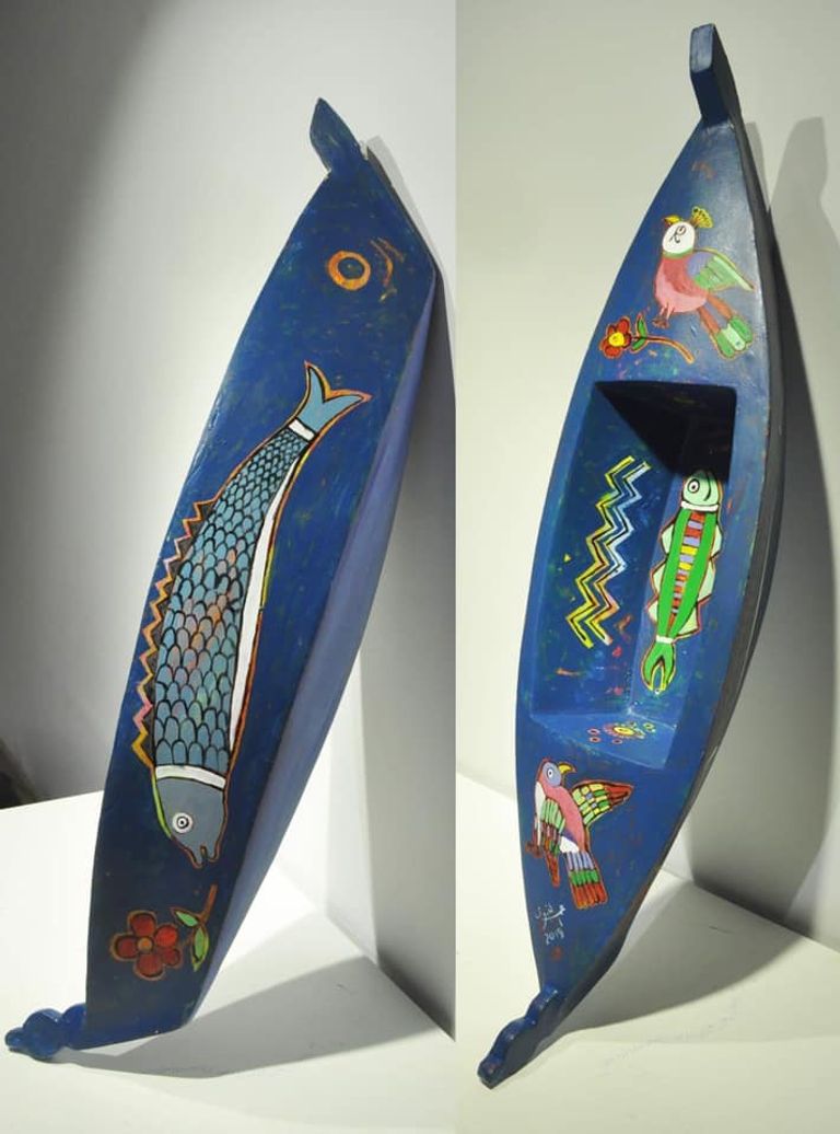 مراكب معروضة بجاليري "آزاد" بالقاهرة