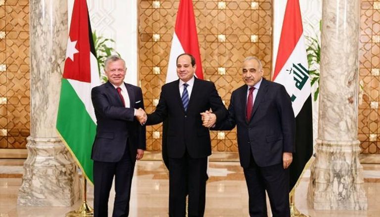 الرئيس المصري وعاهل الأردن ورئيس وزراء العراق قبل القمة الثلاثية