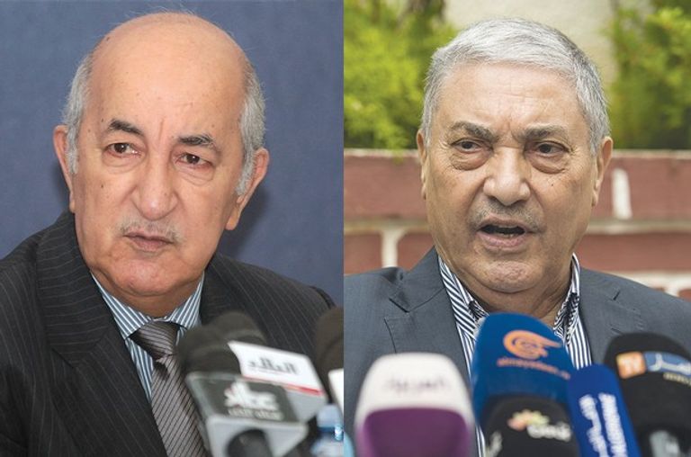 رئيسا الوزراء السابقين علي بن فليس وعبد المجيد تبون عملية فرز أصوات في انتخابات جزائرية سابقة - أرشيفية