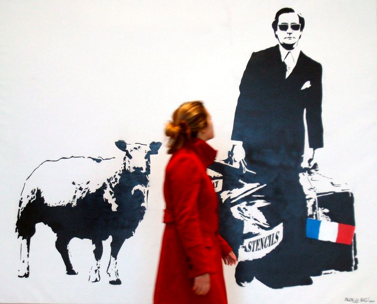 جرافيتي لفنان الشارع البريطاني بانكسي في كوينز بنيويورك