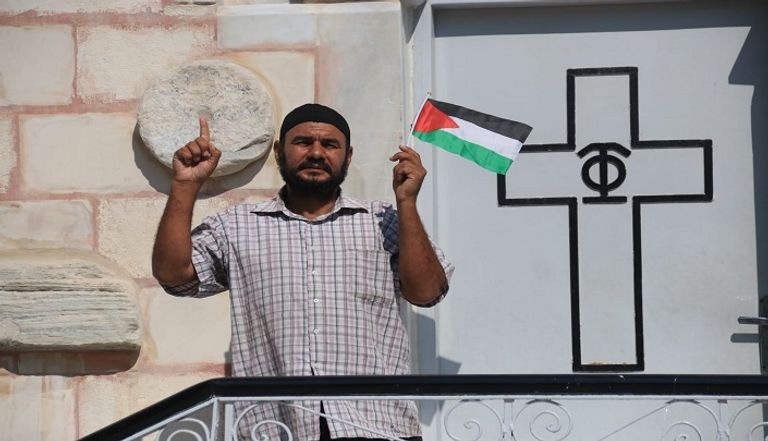 أجراس الكنائس تعانق تكبيرات المساجد في ذكرى وعد بلفور بغزة