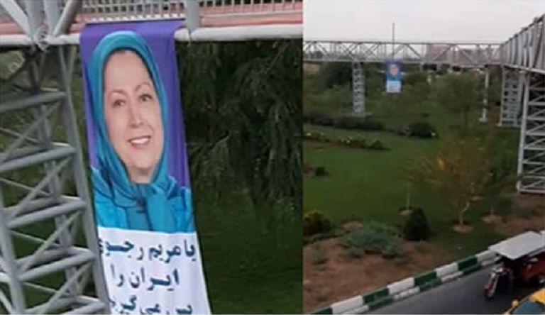 لافتة داعمة لرجوي على إحدى طرق طهران مريم رجوي زعيمة المعارضة الإيرانية