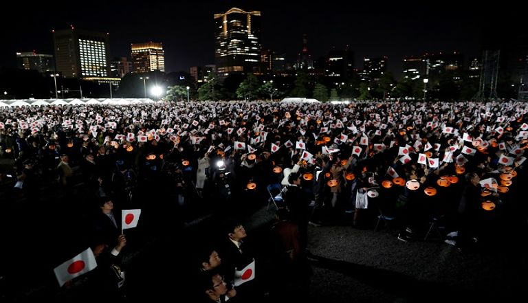 الإمبراطور الياباني الجديد ناروهيتو وزوجته - رويترز