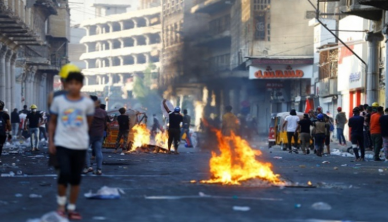 مصادمات بين المتظاهرين العراقيين ومليشيات الحشد - رويترز