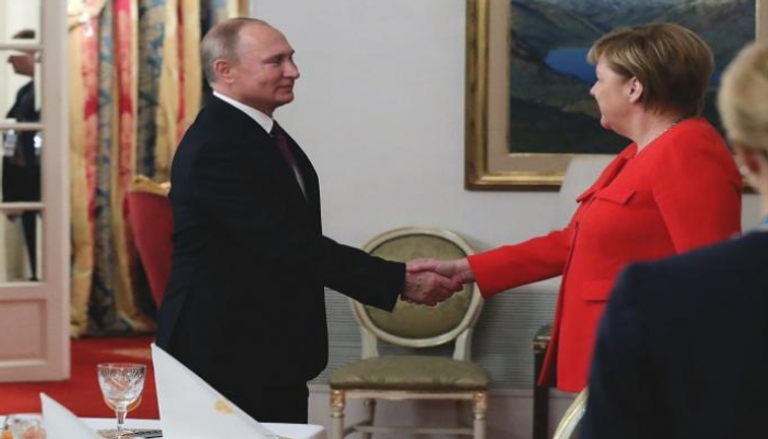 الرئيس الروسي فلاديمير بوتين والمستشارة الألمانية أنجيلا ميركل 