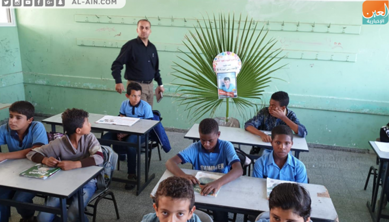 صور الشهداء من الطلبة وضعت على مقاعدهم في مدارس قطاع غزة