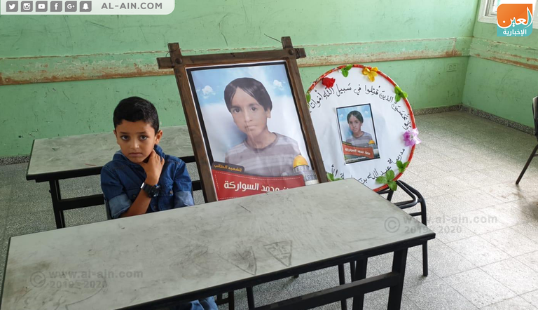 صور الشهداء من الطلبة وضعت على مقاعدهم في مدارس قطاع غزة