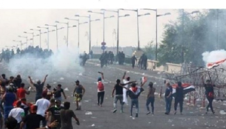 اشتباكات بين المتظاهرين وقوات الأمن العراقية - أرشيفية