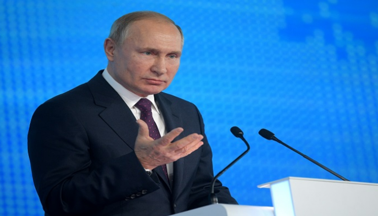 الرئيس الروسي خلال كلمته بمؤتمر الحزب الحاكم - رويترز 