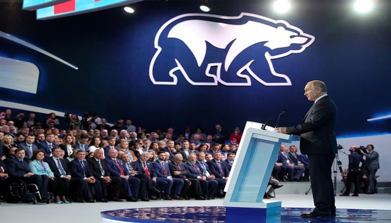 الرئيس الروسي خلال كلمته بمؤتمر الحزب الحاكم - رويترز 