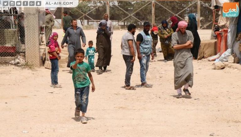 نازحون سوريون في مخيم 