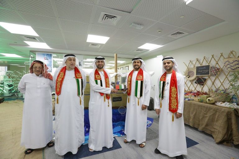 جانب من احتفالات سوق أبوظبي للأوراق المالية باليوم الوطني