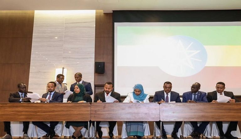 آبي أحمد يتصدر الموقّعين على وثيقة الاندماج