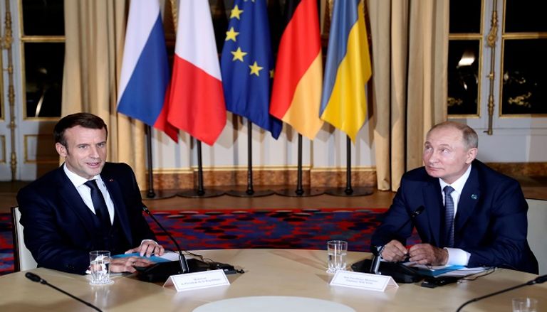 الرئيس الروسي ونظيره الأوكراني خلال جلسة المباحثات- أ.ف.ب