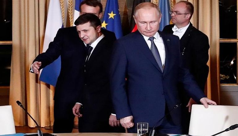 الرئيس الروسي ونظيره الأوكراني خلال جلسة المباحثات- أ.ف.ب
