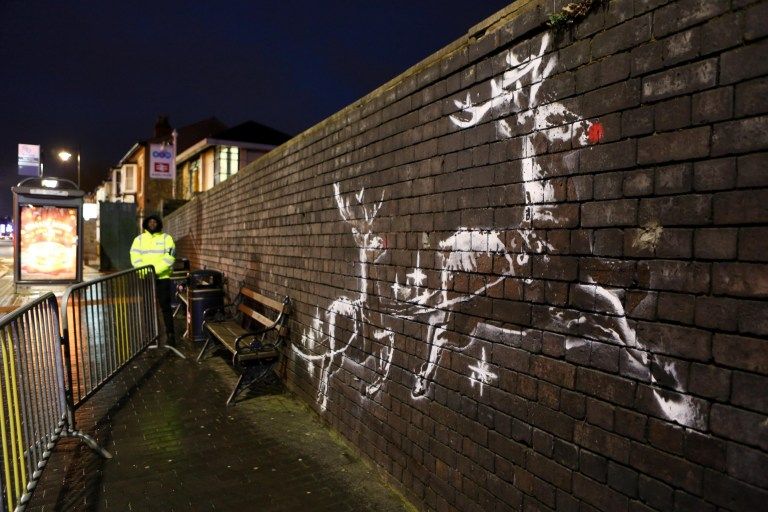 جدارية بانكسي قبل التشويه