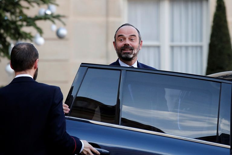 رئيس الوزراء الفرنسي ادوارد فيليب الرئيس الفرنسي إيمانويل ماكرون- أ ف ب