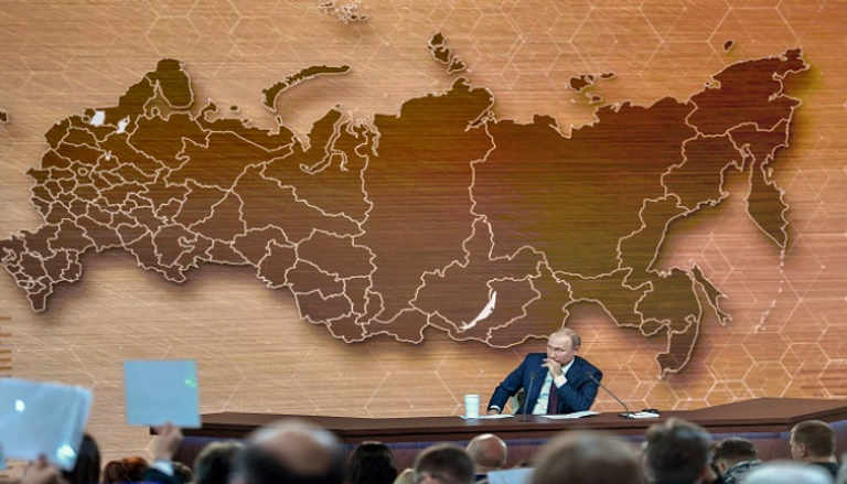 الرئيس الروسي فلاديمير بوتين خلال المؤتمر الصحفي - أ ف ب