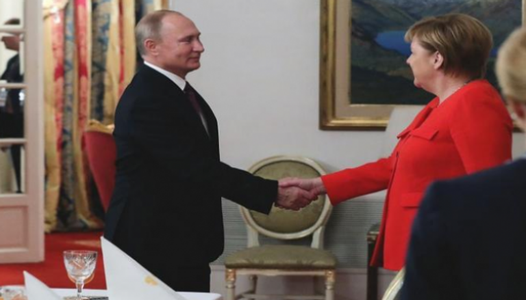 الرئيس الروسي فلاديمير بوتين والمستشارة الألمانية أنجيلا ميركل
