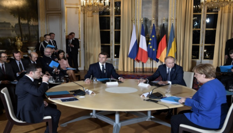 الرئيس الروسي ونظيره الأوكراني خلال جلسة مباحثات- أ.ف.ب - أرشيفية