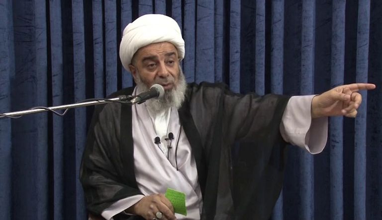 عناصر تابعة لكتائب حزب الله العراق تستعرض قواتها - أرشيفية