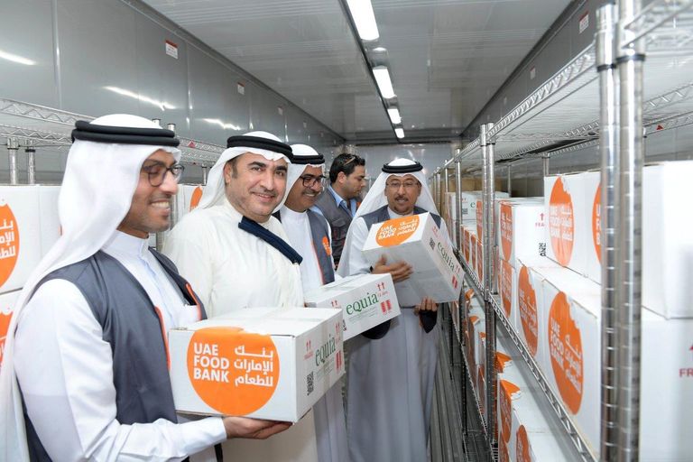 توزيع سلال غذائية خلال تدشين الموقع الجديد لبنك الإمارات للطعام