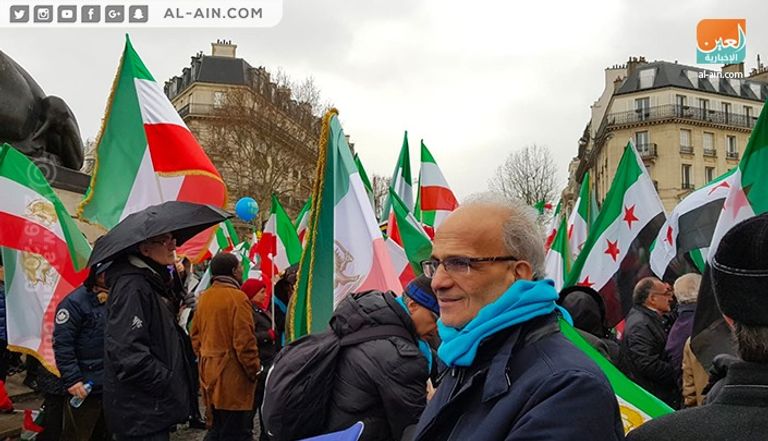 صور مريم رجوي تتصدر مسيرة المعارضة بباريس