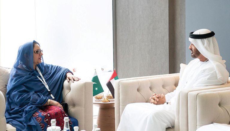 الشيخ محمد بن زايد وزبيدة جلال وزيرة الإنتاج الحربي بباكستان الشيخ محمد بن زايد ورئيس الهيئة الحكومية للصناعات العسكرية ببيلاروسيا