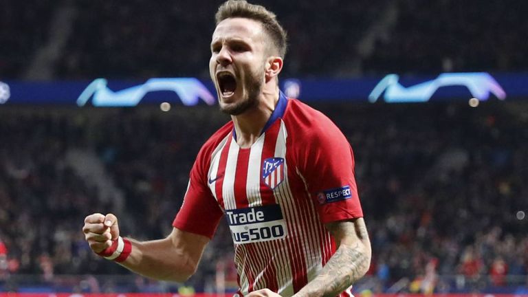 ساؤول نيجيز لاعب وسط أتلتيكو مدريد إيفان راكيتيتش لاعب وسط برشلونة