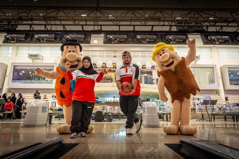 سوبر مان مع أحد أصحاب الهمم خلال الزيارة المفاجئة