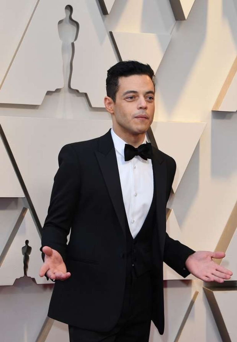 رامي مالك ولوسي بوينتون على السجادة الحمراء