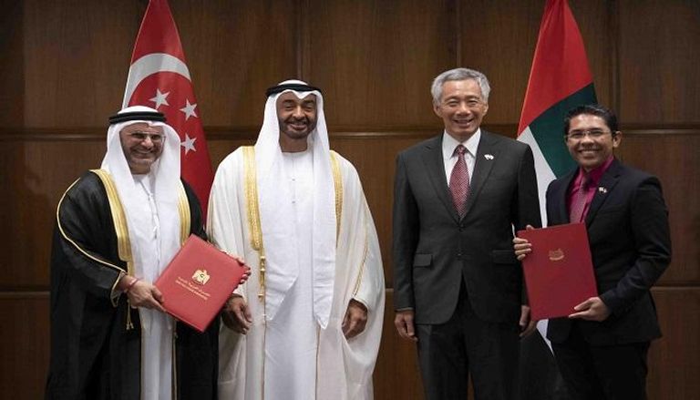 الشيخ محمد بن زايد يشهد توقيع اتفاقيات مع سنغافورة