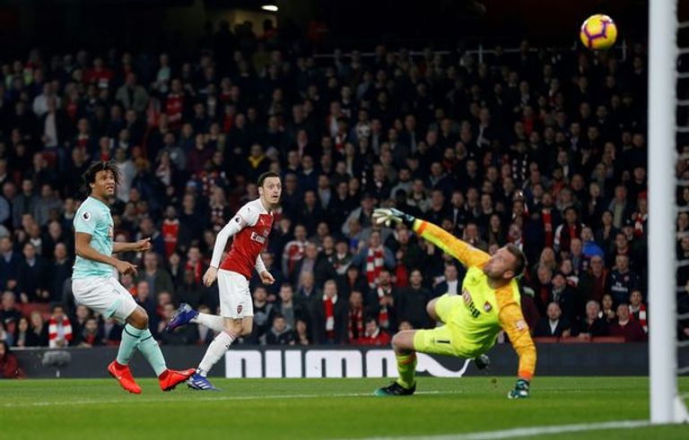 أوزيل يسجل في بورنموث إيمري ونظيره في توتنهام ماوريسيو بوكيتينو