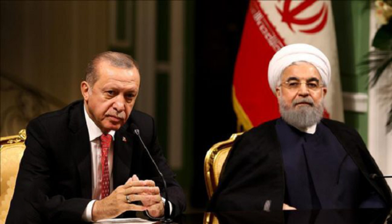 أردوغان والرئيس الإيراني حسن روحاني 