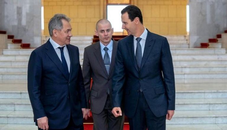 الرئيس السوري بشار الأسد مع وزير الدفاع الروسي سيرجي شويغو