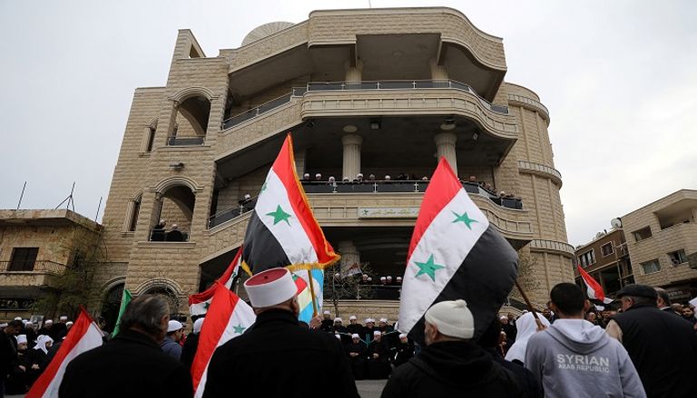 أهالي الجولان يتظاهرون ضد قرار ترامب - رويترز