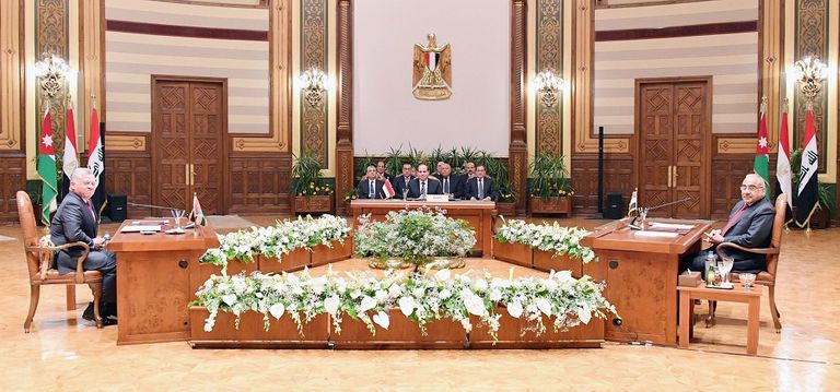 الرئيس المصري وعاهل الأردن ورئيس وزراء العراق قبيل القمة الثلاثية