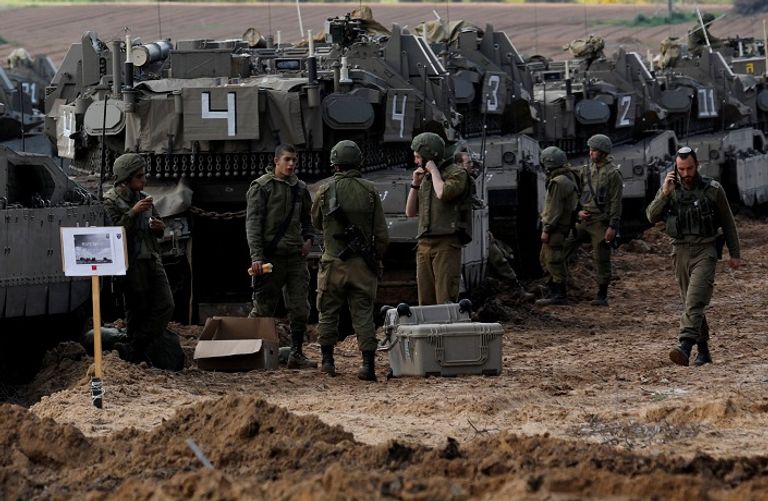 قوات إسرائيلية على حدود غزة قوات إسرائيلية على حدود غزة